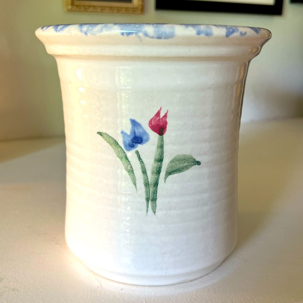 Pretty handmade crock pottery with tulips